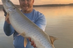 Kerry Rhodes, Mantua, OH, with the second of two muskies on back-to-back casts on West Branch Reservoir, OH.